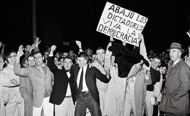 A crowd greeted Fidel Castro at the Princeton Junction train station. Below, after speaking at a conference on campus, Castro stopped to talk with students and others on Washington Road.