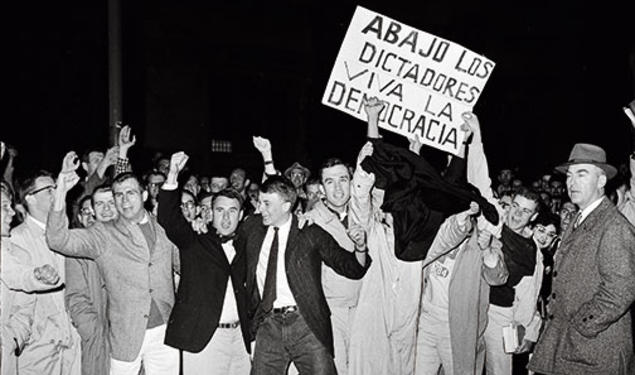 A crowd greeted Fidel Castro at the Princeton Junction train station. Below, after speaking at a conference on campus, Castro stopped to talk with students and others on Washington Road.