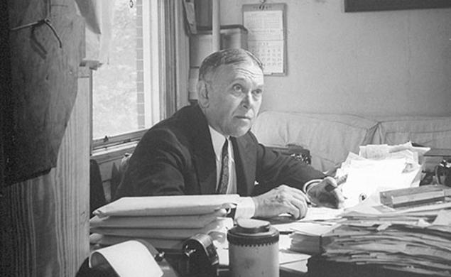 H.L. Mencken writes at his desk in Baltimore in the mid-1940s.