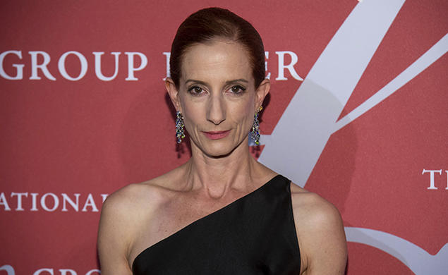 A headshot photo of Vanessa Friedman ’89 in front of a step and repeat at a gala event.