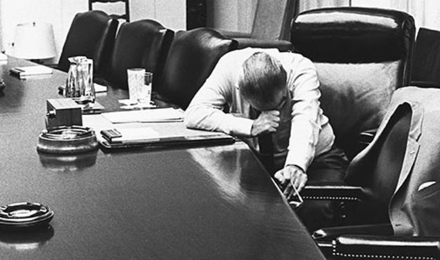 President Lyndon B. Johnson listens to a tape-recorded message from his son-in-law, Marine Capt. Charles Robb, who was in Vietnam, in 1968.