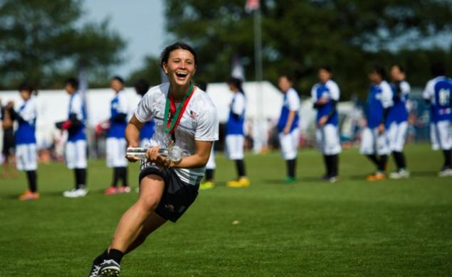 Lyra Olson â16 accepts the team spirit trophy for the United States at Julyâs World Under-23 Ultimate Championships. (Ultiphotos/Kevin Leclaire) 
