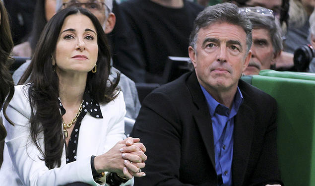 Emilia Fazzalari, left, and Wyc Grousbeck ’83 watch an NBA basketball game between the Celtics and the Miami Heat on Nov. 30, 2022.