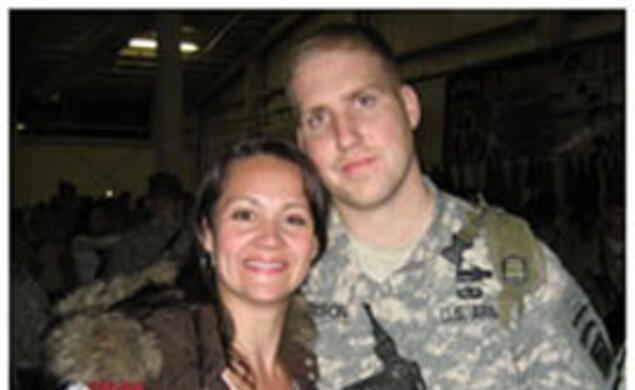 as061108Nelson.jpg Lauren (Holuba) Nelson '04, shown with her husband Tom in February, was honored for her efforts supporting wives and families of men who served in Afghanistan and Iraq.