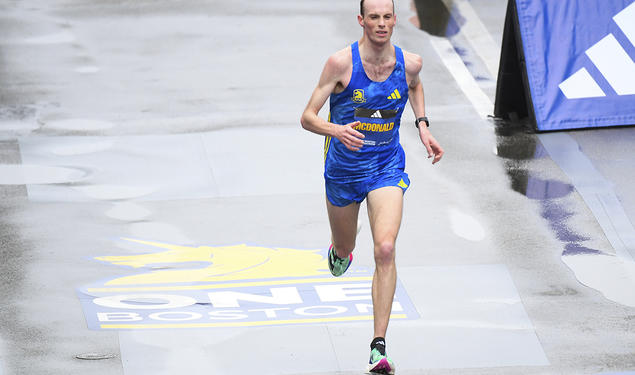 lone runner near the finish line of the Boston Marathon