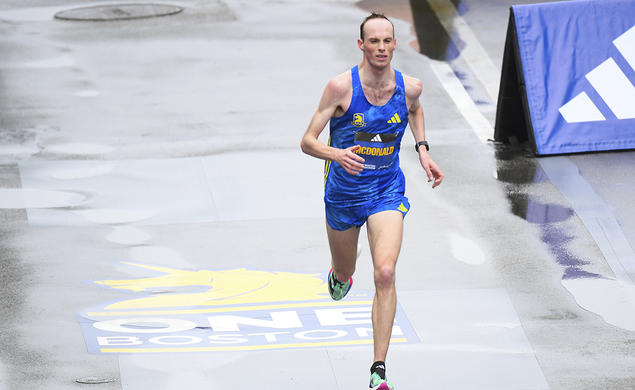 lone runner near the finish line of the Boston Marathon