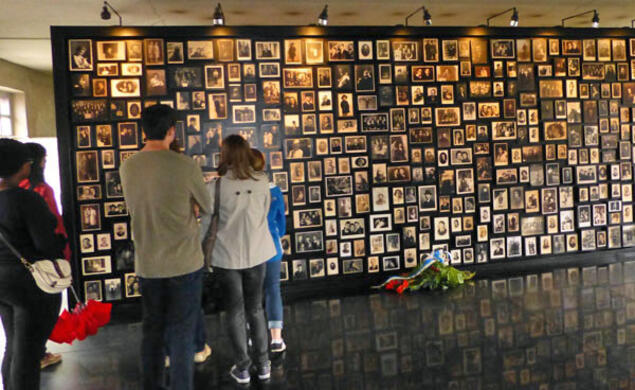 Princeton students learning about the history of Polish Jews view photos at Birkenau, part of the Auschwitz concentration camp in Poland built by the Nazis.