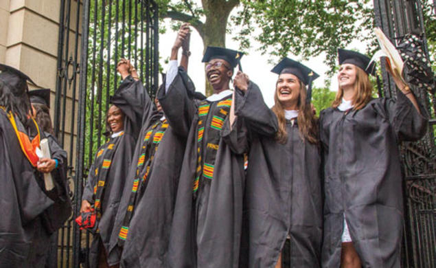Graduates from the Great Class of 2015 rejoice as they exit campus through FitzRandolph Gate.