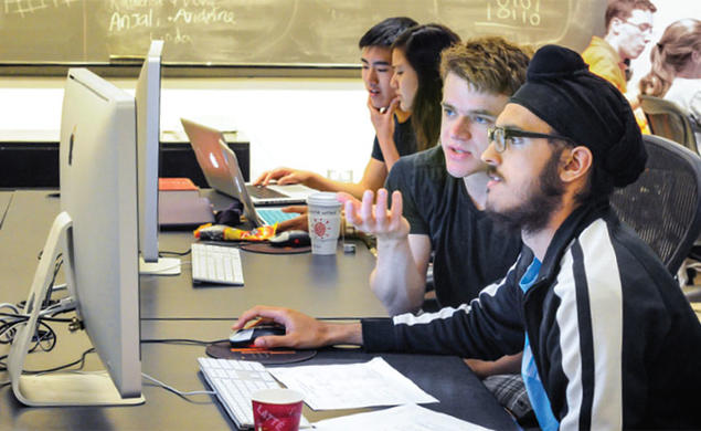 Student demand for computer science courses is skyrocketing. Here, students collaborate on computer science problem sets in the Friend Center.