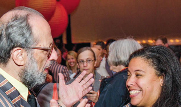 Eli Arthur Schwartz *60 and Patrice Jean *99, adorned in their Association of Princeton Graduate Alumni Reunions jackets, enjoy a conversation during the “Many Minds, Many Stripes” conference.