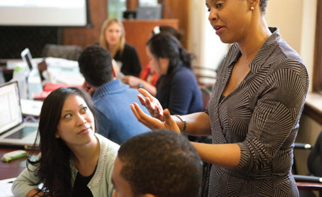 Associate Professor of Psychology and African American Studies Stacey Sinclair, shown here talking with students in a course on prejudice and social stigma, is among many Princeton faculty members whose teaching and research investigate issues of race and