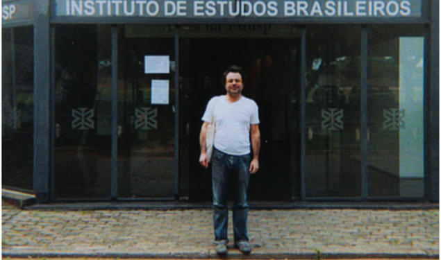 Dylon Robbins, standing in front of the Instituto de Estudos Brasileiros at the Universidade de São Paulo in Brazil, where he is conducting research for his dissertation. 