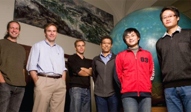 Newly appointed geosciences professor Jeroen Tromp *92, second from left, meets with members of his research group in Guyot Hall.