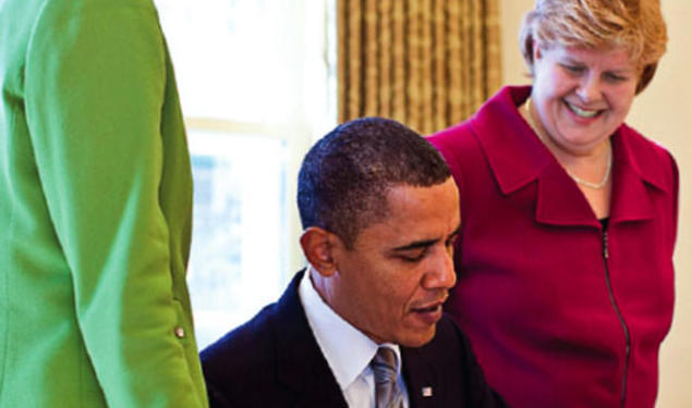 Wells Professor of Economics and Public Affairs Cecilia Rouse (left) and former Princeton faculty member Christina Romer join President Obama in the Oval Office in their roles as members of his Council of Economic Advisers.