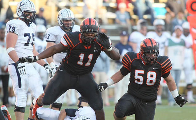 Caraun Reid â14, left, made an impression on Ivy League quarterbacks. Heâs hoping to do the same in the NFL. (Beverly Schaefer)