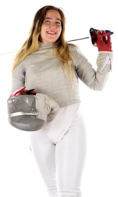 This is a photo of Chloe Fox-Gitomer ’23 in her fencing gear.