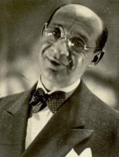 This is a black-and-white headshot photo of Fritz Grünbaum.