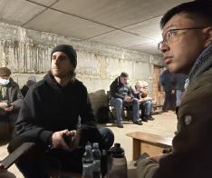 People wait in a bomb shelter in Ukraine.
