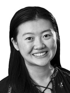 This is a black-and-white headshot photo of Allison Tang.