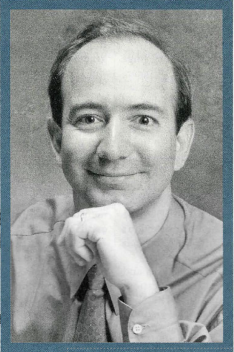 A young Jeff Bezos smiling into the camera