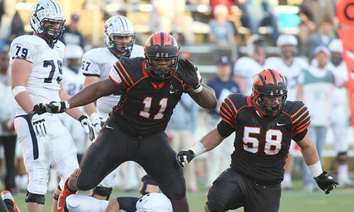 Defensive Lineman Reid ’14 Prepares for the NFL Draft (and Sings Sam Cooke)