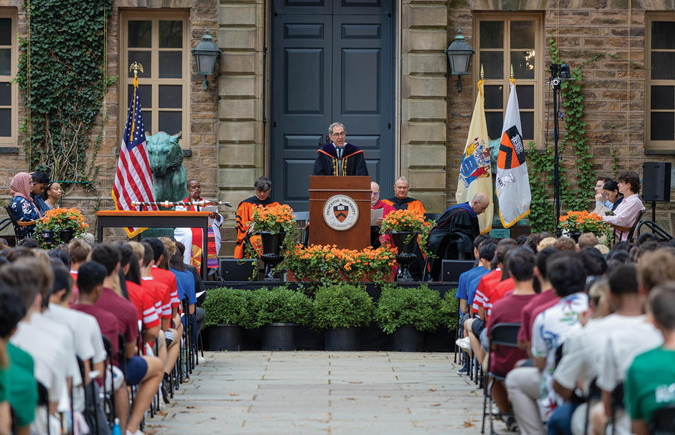 President Eisgruber addresses the incoming 2028 class from a podium in front of Nassau Hall.