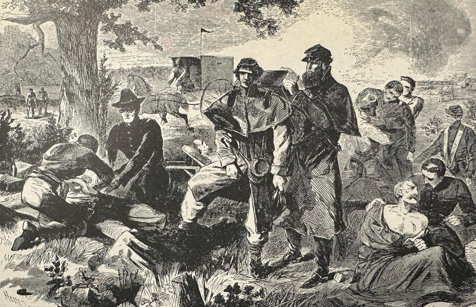 A surgeon at work on the battlefield during an engagement