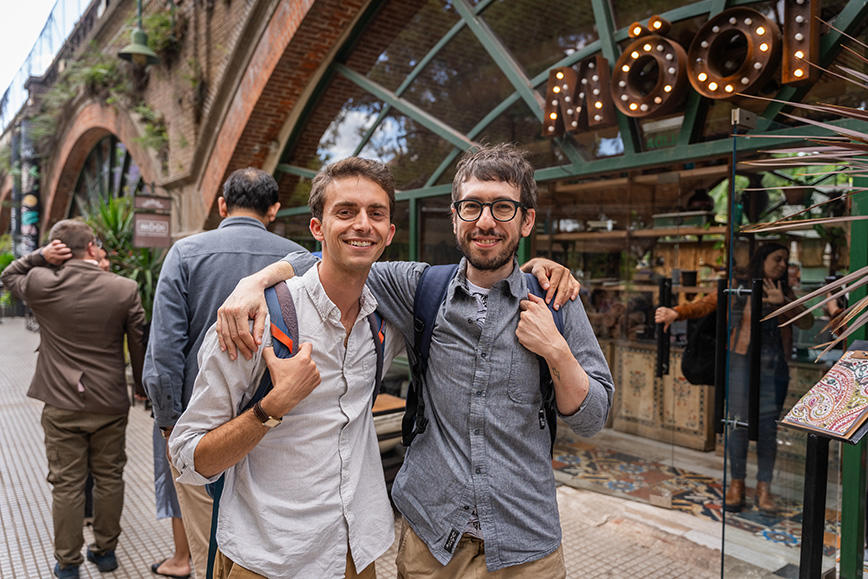 Jordan Salama '19 and Javier Sinay, an Argentine non-fiction writer, pose outside a restaurant by the Rosedal Garden.