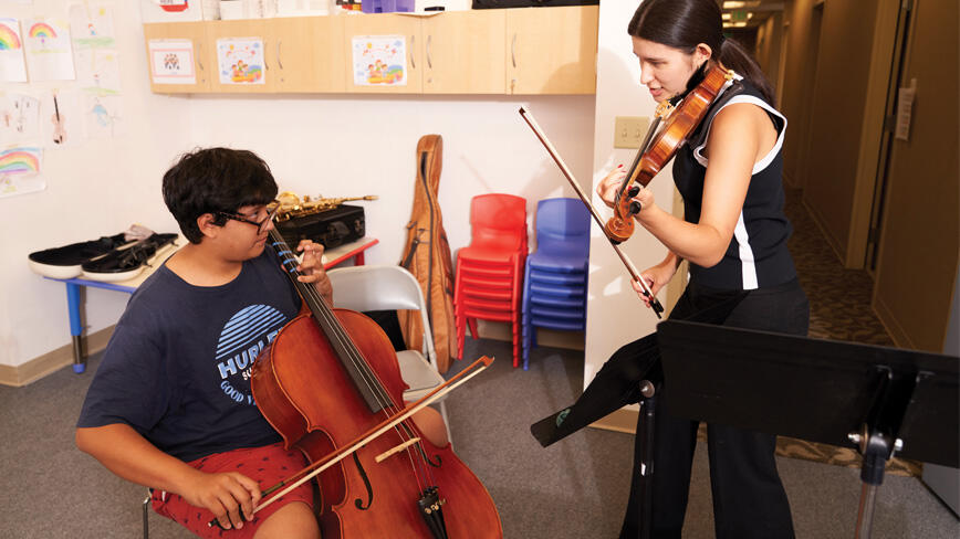 PRINCE_INTEMPO 2.jpg Princeton sophomore and RISE intern Anabel Guerreiro works with an INTEMPO student during a summer music session