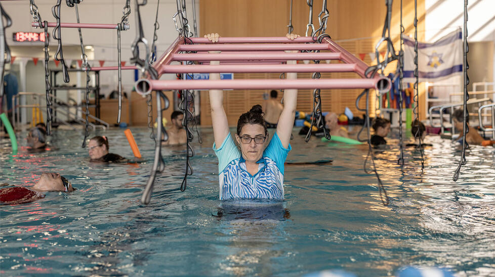 Ms. Tsurkov training in the therapy pool at Sheba Medical Center in Ramat Gan, Israel.