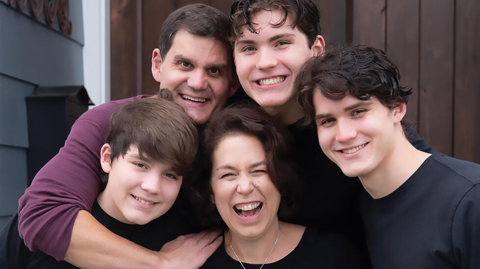 Clockwise from top left, Jason Constantine ’92 with sons Xander ’27 and Lucas, wife Kristin ’91, and youngest son Nicholas shown in 2021 before Constantine had his first brain surgery. 