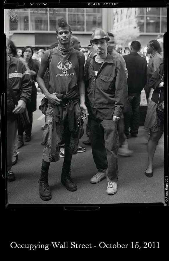 Malcolm Nokizaru, left, with another protester. (Photos © Accra Shepp '84) 