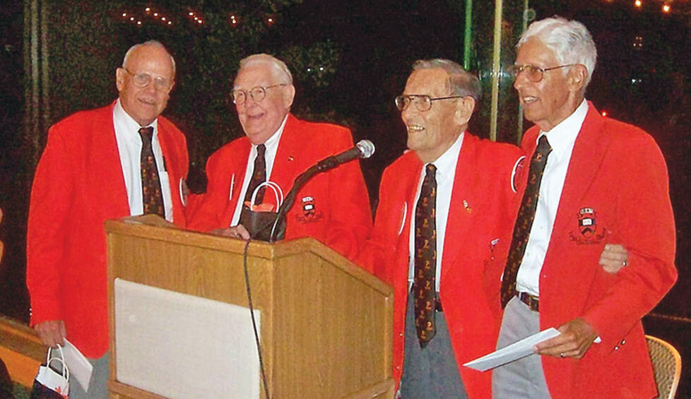 Class of '47 officers at their 60th reunion class dinner are, from left, Reunions chairman Bob Tritsch, president Jack Hughes, secretary Asa Bushnell, and treasurer Arvind "Koke" Kokatnur. Bushnell has returned to Princeton for three class reunions since