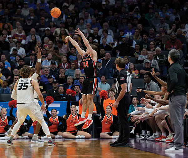 Blake Peters ’25 sinks a 3-pointer against Missouri. 