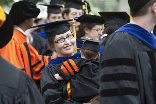  Lillian Pierce ’02 *09, who received her Ph.D. in mathematics, with her 2-month-old son, Stirling Overath-Pierce.