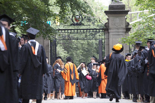 Undergraduates file into their seats near the end of the procession.