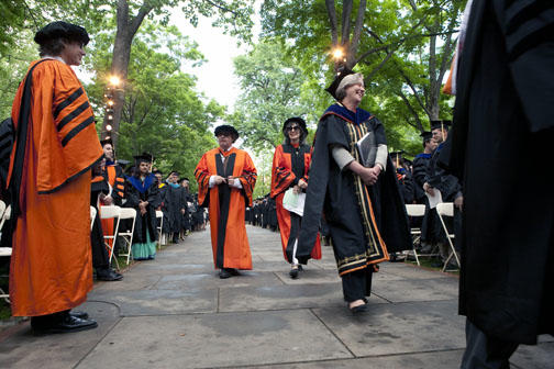 President Tilghman makes her way to the stage in front of Nassau Hall.