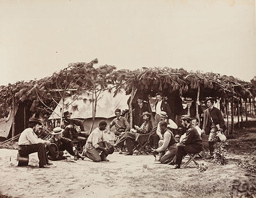 A Fancy Group, Front of Petersburg, August 1864: A pair of “contrabands” — freed slaves who provided logistical support to the Union side — ready their champions for a cockfight. “Such displays were always ludicrous,” notes Gardner, “and wer