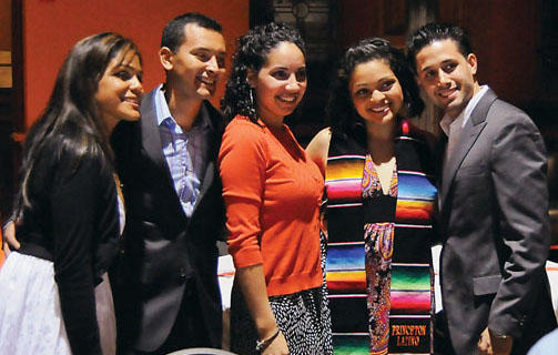 Johanna Lopez ’09, second from right, with family and friends at the ceremony for Latino graduates May 31.