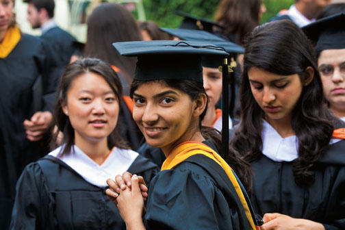 Sharonmoyee Goswami ’09, center, and classmates Mary Huang, left, and Sarah Dajani await the start of the Commencement ceremony.