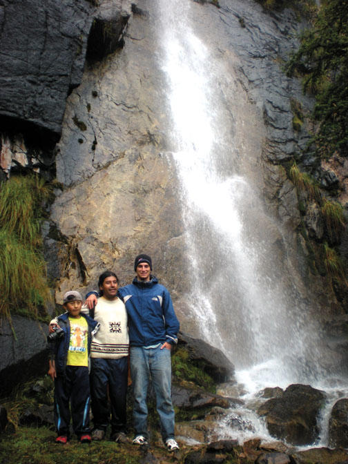 Brian Reilly ’14, far right, at a waterfall in Peru.