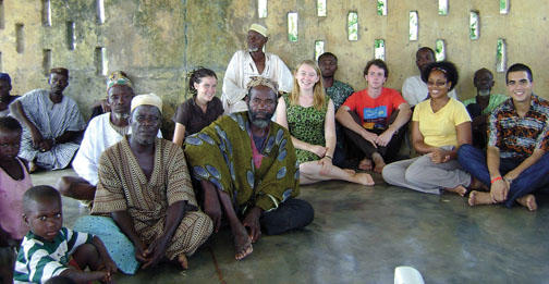 Cole Freeman ’14, wearing red T-shirt, with other bridge-year students and local residents in Dalun, Ghana.