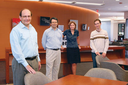 In the new home of the Center for Theoretical Science are, from left, center director Paul Steinhardt, associate director Igor Klebanov *86, and postdocs Aleksandra Walczak and Thomas Klose.