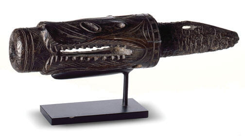 LIVE.NB_PUAMharpoon.jpg Part of a harpoon, carved from walrus ivory to suggest a predator of marine animals. The harpoon is believed to be from Alaska’s St. Lawrence Island.
