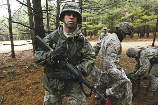 LIVE.NB_ROTC1.jpg Peter Yorck ’10 with other ROTC cadets during field-training exercises March 28 at Fort Dix. At rear center is Lt. Col. John Stark, ROTC commander.