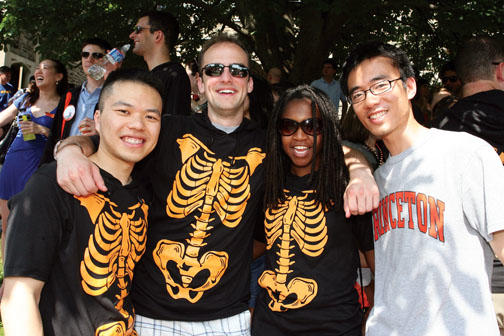 Members of ’06, including, from left, Kent Cheng, Robert J. Moore, Stephanie Malone, and Kirk Hou, took their theme from another celebration of orange and black: Halloween.