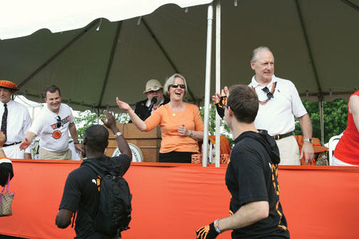 HIGH-FIVES: A quick hello with the president at the reviewing stand.