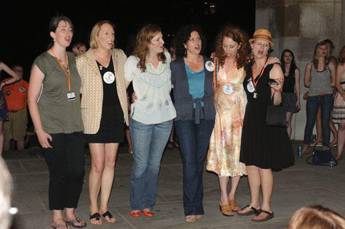 SISTERS IN SONG: Tigerlilies alumnae reunite at Blair Arch.