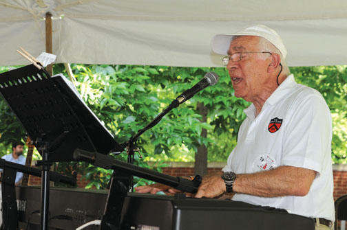 FRIENDLY BATTLE: Jim Freund ’56, with the Freund Family Trio at the “Battle of the Alumni Bands.”
