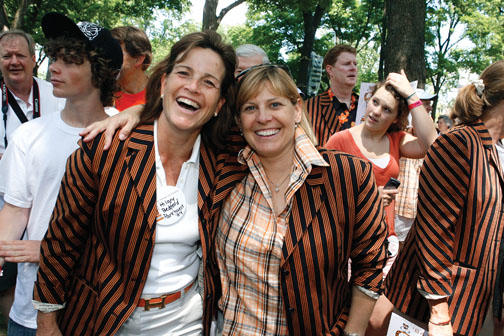 Hilary Bedford Parkhurst ’84, left, and Ginny Russell Merrifield ’84 enjoy their new jackets — and each other.